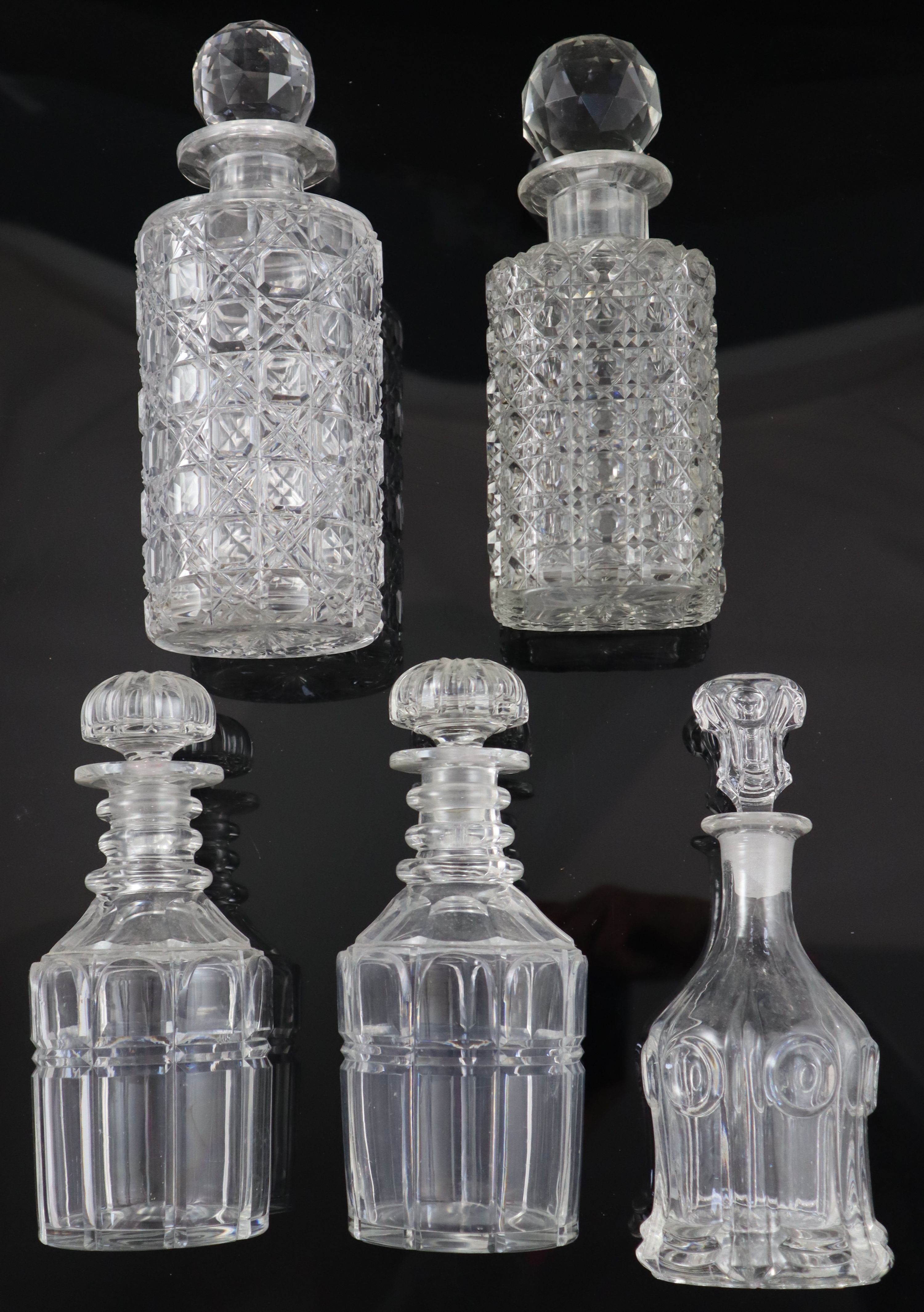 Five assorted Victorian and later cut glass decanters